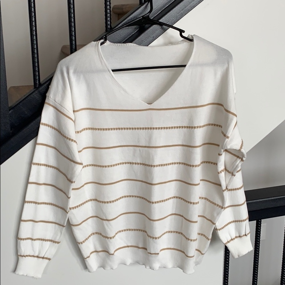 White and tan V neck sweater